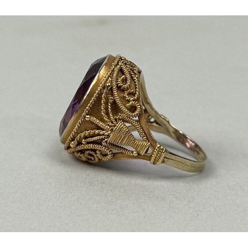 329 - AN ANTIQUE AMETHYST AND HIGH CARAT FILIGREE GOLD RING
Weight: 7.2gms