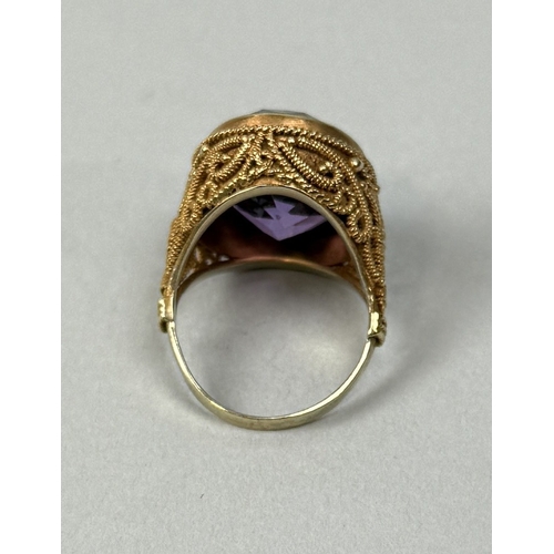 329 - AN ANTIQUE AMETHYST AND HIGH CARAT FILIGREE GOLD RING
Weight: 7.2gms