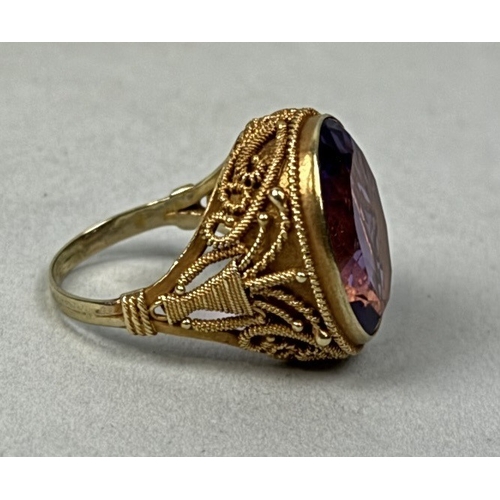 329 - AN ANTIQUE AMETHYST AND HIGH CARAT FILIGREE GOLD RING
Weight: 7.2gms