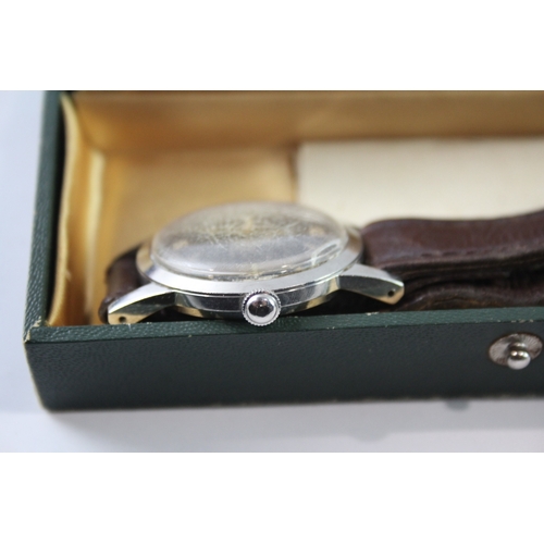 343 - A VINTAGE TURLER SIGNED BOXED WATCH
Hand wind, in working order.