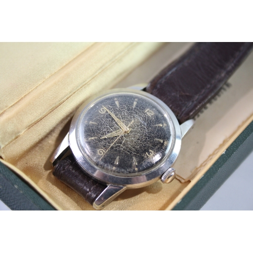 343 - A VINTAGE TURLER SIGNED BOXED WATCH
Hand wind, in working order.