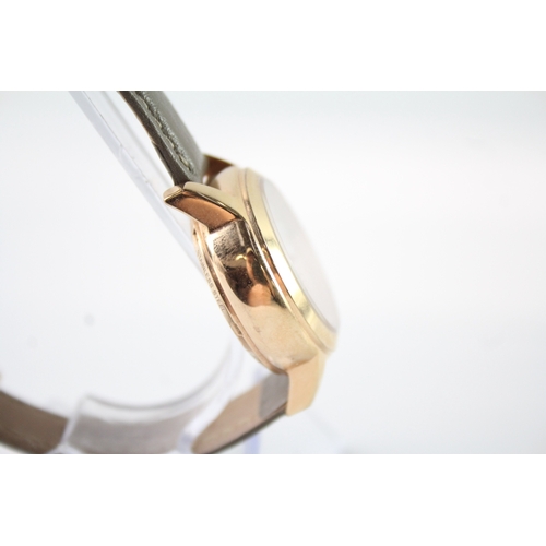 344 - A CLOGAU GOLD TONE WATCH
Automatic, in working order.