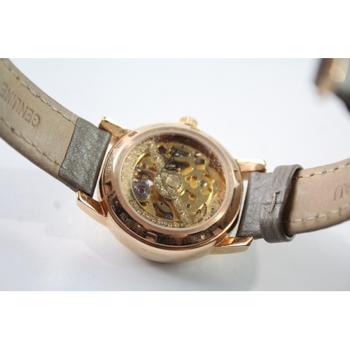 344 - A CLOGAU GOLD TONE WATCH
Automatic, in working order.