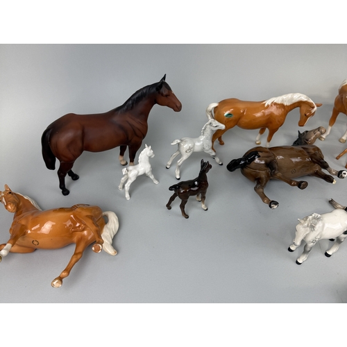 370 - A COLLECTION OF BESWICK POTTERY HORSES