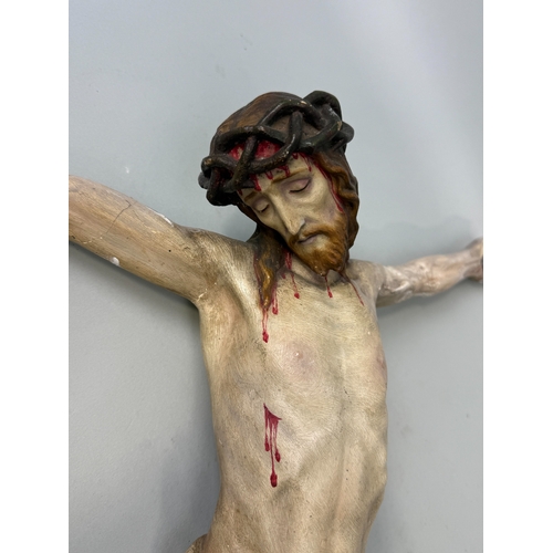 391 - AN ANTIQUE PAINTED PLASTER CORPUS CHRISTI
59cm x 52cm