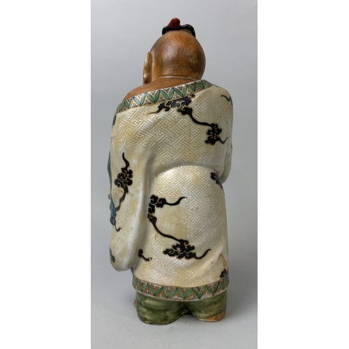 396 - A JAPANESE CERAMIC FIGURE WITH A CHILD
32cm H