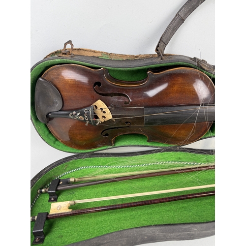 402 - AN ANTIQUE VIOLIN IN CASE WITH TWO BOWS
 Ivory license for bow: Y5SYWF7R