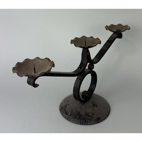 406 - A BRONZE AND METAL THREE ARM PRICKET CANDLESTICK
36cm x 18cm