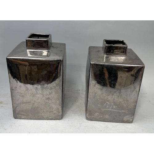 413 - A PAIR OF CERAMIC METALLIC PAINTED VASES
36cm x 22cm each.