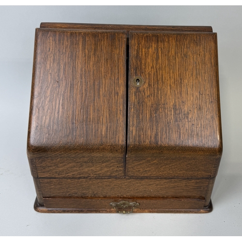 419 - AN ANTIQUE OAK DESK TIDY
When closed 32cm x 29cm