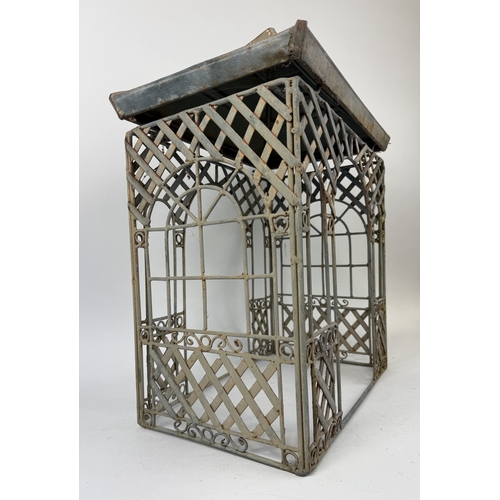 427 - A SMALL IRON GARDEN HOUSE
 
60 x 43 x 27 cm