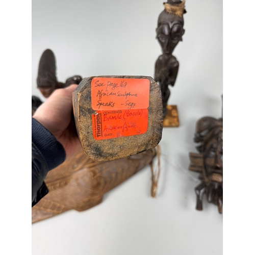 81 - A COLLECTION OF TRIBAL WOODEN FIGURES
To include:
Chambri Lakes, Papua New Guinea, label dating '193... 