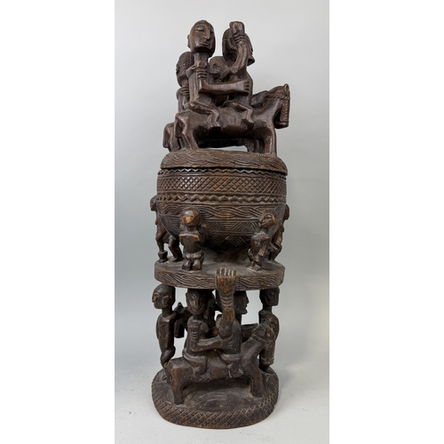 91 - A LARGE CARVED WOOD DOGON MALI CONTAINER
76cm H
Provenance: With handwritten label '1985...Bought in... 