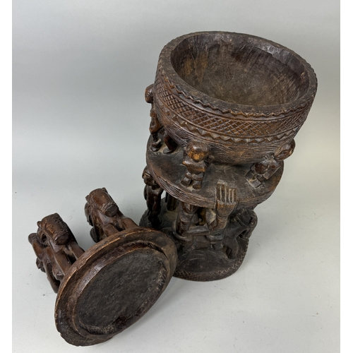 91 - A LARGE CARVED WOOD DOGON MALI CONTAINER
76cm H
Provenance: With handwritten label '1985...Bought in... 