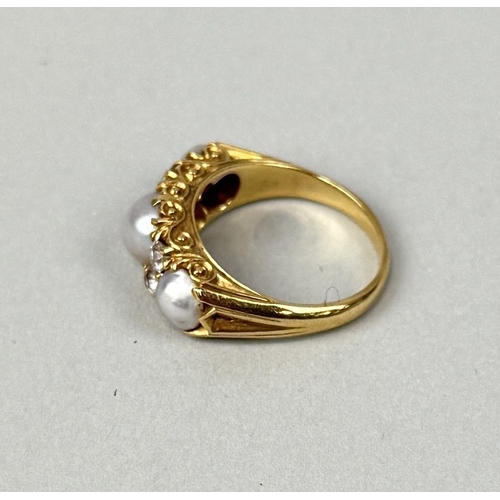 13 - AN ANTIQUE GOLD RING SET WITH THREE PEARLS AND FOUR DIAMONDS
Weight: 5.6gms