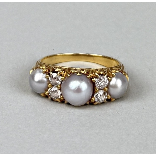 13 - AN ANTIQUE GOLD RING SET WITH THREE PEARLS AND FOUR DIAMONDS
Weight: 5.6gms