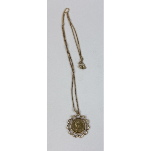 12 - A QUEEN ELIZABETH II 9CT GOLD HALF SOVEREIGN, IN 9CT GOLD MOUNT WITH 18CT GOLD CHAIN
Total weight: 1... 