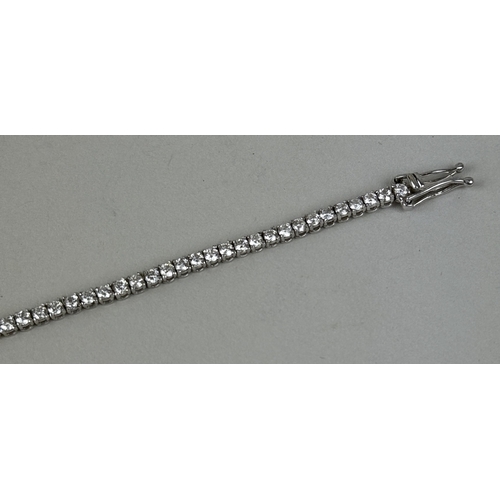 13 - AN 18CT WHITE GOLD TENNIS BRACELET SET WITH DIAMONDS
Weight: 6.6gms