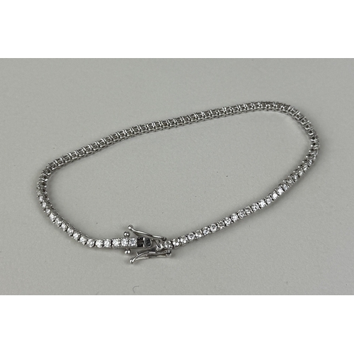 13 - AN 18CT WHITE GOLD TENNIS BRACELET SET WITH DIAMONDS
Weight: 6.6gms