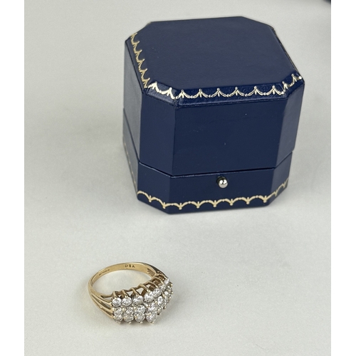 15 - A 9CT GOLD THREE ROW DIAMOND RING SET WITH 21 DIAMONDS
Weight: 4.1gms