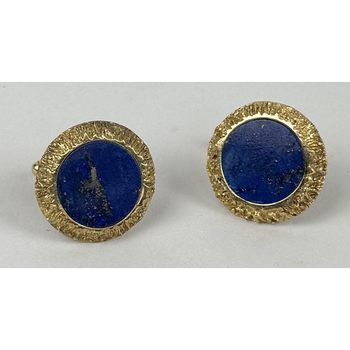 18 - A PAIR OF 14CT GOLD CUFFLINKS SET WITH LAPIS LAZULI
Total weight: 16.27gms
2.4cm D
Textured gold sur... 