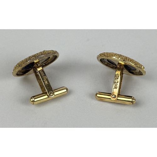18 - A PAIR OF 14CT GOLD CUFFLINKS SET WITH LAPIS LAZULI
Total weight: 16.27gms
2.4cm D
Textured gold sur... 