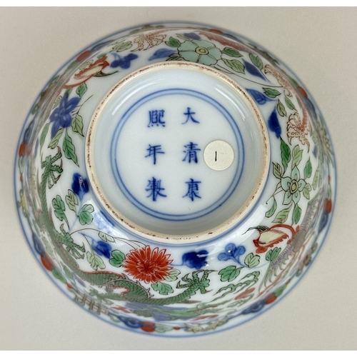 2 - A CHINESE PORCELAIN DRAGON AND PHOENIX BOWL, KANGXI MARK AND OF THE PERIOD
The Imperial bowl painted... 