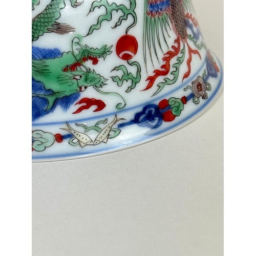 2 - A CHINESE PORCELAIN DRAGON AND PHOENIX BOWL, KANGXI MARK AND OF THE PERIOD
The Imperial bowl painted... 
