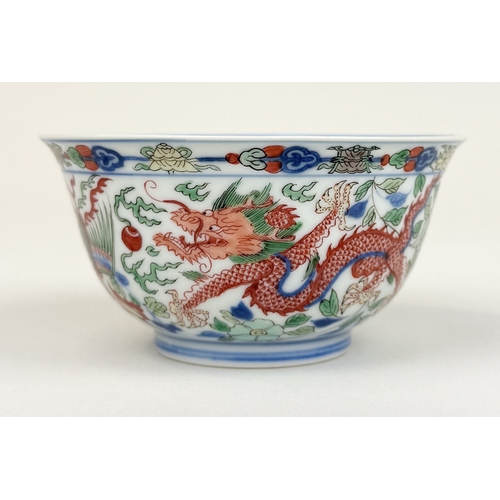 2 - A CHINESE PORCELAIN DRAGON AND PHOENIX BOWL, KANGXI MARK AND OF THE PERIOD
The Imperial bowl painted... 