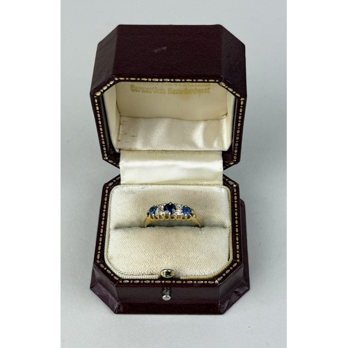 22 - AN 18CT GOLD SEVEN STONE RING SET WITH SAPPHIRES AND DIAMONDS
Weight: 4.09gms