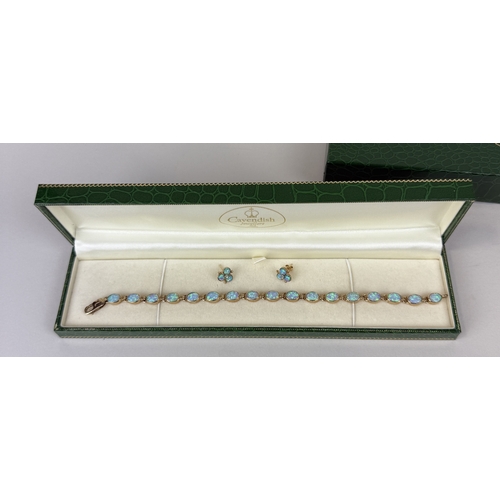 25 - A 9CT GOLD AND OPAL BRACELET AND EARRINGS SET
Total weight: 13.6gms