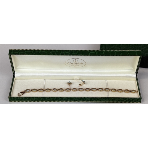 25 - A 9CT GOLD AND OPAL BRACELET AND EARRINGS SET
Total weight: 13.6gms