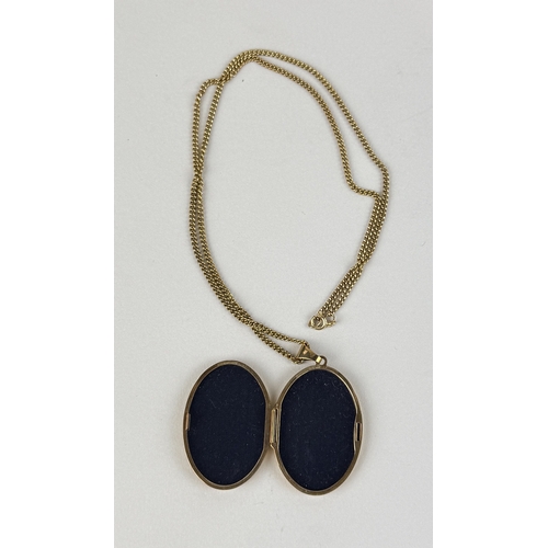 27 - A 9CT GOLD LOCKET AND CHAIN
Total weight: 13.0gms