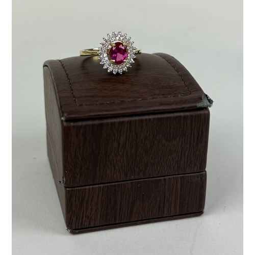31 - AN 18CT GOLD RING SET WITH OVA CUT RUBY COLOURED STONE
Size Q
Weight: 3.6gms