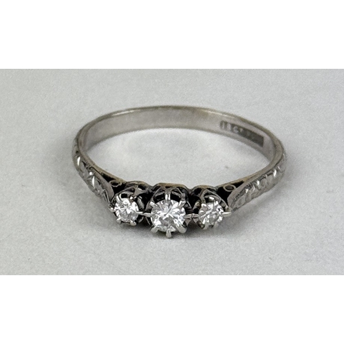 32 - AN 18CT GOLD AND PLATINUM THREE STONE DIAMOND RING
Weight: 2.8gms