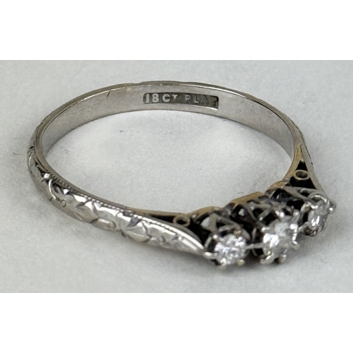 32 - AN 18CT GOLD AND PLATINUM THREE STONE DIAMOND RING
Weight: 2.8gms