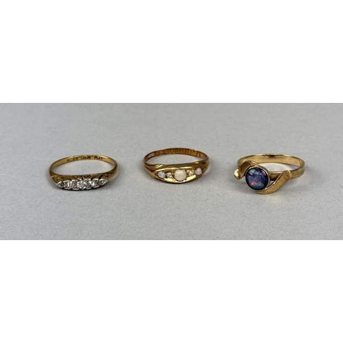 48 - TWO 18 CT GOLD RINGS ALONG WITH A 9 CT GOLD RING
Two set with opals, one with diamonds
Total weight:... 