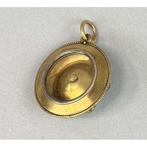 49 - AN ANTIQUE GOLD PENDANT SET WITH TURQUOISE
Weight: 8.8 gms