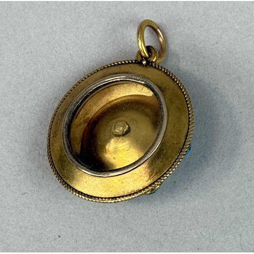 49 - AN ANTIQUE GOLD PENDANT SET WITH TURQUOISE
Weight: 8.8 gms