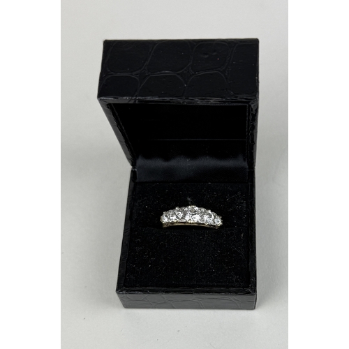 8 - AN 18CT GOLD FIVE STONE DIAMOND RING, CENTRAL DIAMOND 1.06CT
 
One central old European cut diamond,... 