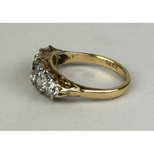 8 - AN 18CT GOLD FIVE STONE DIAMOND RING, CENTRAL DIAMOND 1.06CT
 
One central old European cut diamond,... 