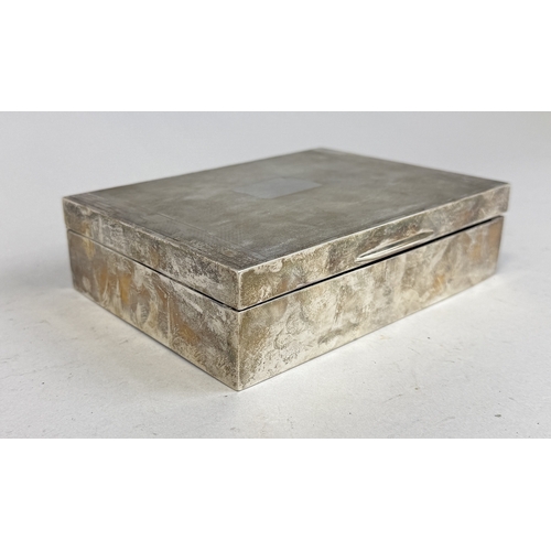 123 - AN ART DECO SILVER CIGARETTE BOX
17 cm x 12 cm