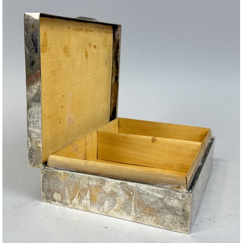 123 - AN ART DECO SILVER CIGARETTE BOX
17 cm x 12 cm