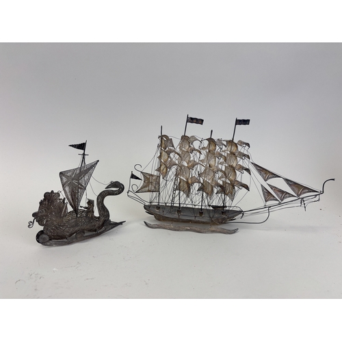 124 - TWO CHINESE SILVER MODELS OF SHIPS
Total weight: 218gms
One marked 925.
Largest 31cm L... 