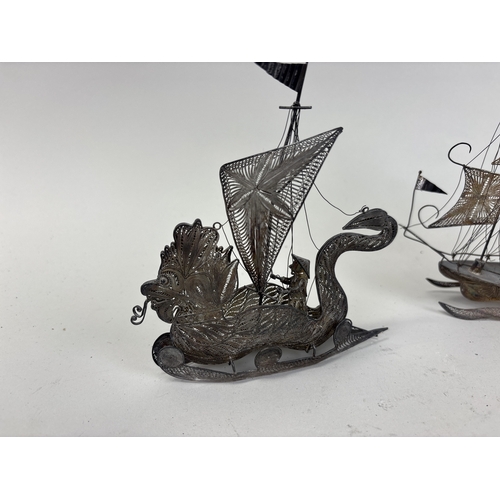 124 - TWO CHINESE SILVER MODELS OF SHIPS
Total weight: 218gms
One marked 925.
Largest 31cm L... 