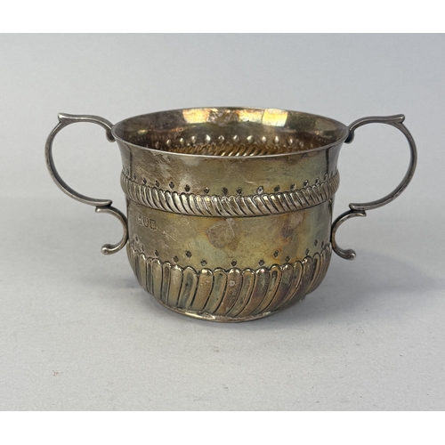 126 - A SILVER TWIN HANDLED CUP
Marked JHR.
15cm x 7.5cm
Weight: 158gms