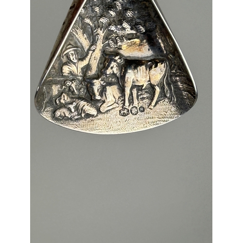 132 - AN ANTIQUE SILVER CADDY SPOON TOGETHER WITH A COMB, PROBABLY DUTCH TOGETHER WITH TWO LONG SPOONS
Tot... 