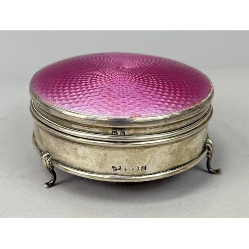 137 - A SILVER AND PINK GUILLOCHE ENAMEL CIRCULAR BOX BY WALKER AND HALL
Lid detached from hinge.
9cm x 4.... 