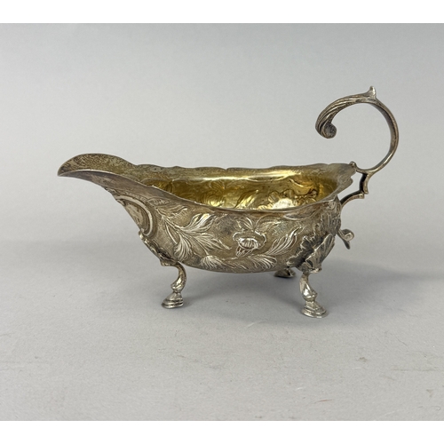 143 - A GEORGIAN SILVER SAUCE BOAT WITH FLORAL REPOUSSE DESIGN
Weight: 115gms
14cm x 9cm... 