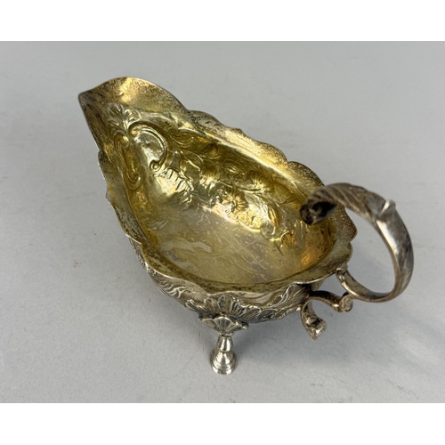143 - A GEORGIAN SILVER SAUCE BOAT WITH FLORAL REPOUSSE DESIGN
Weight: 115gms
14cm x 9cm... 